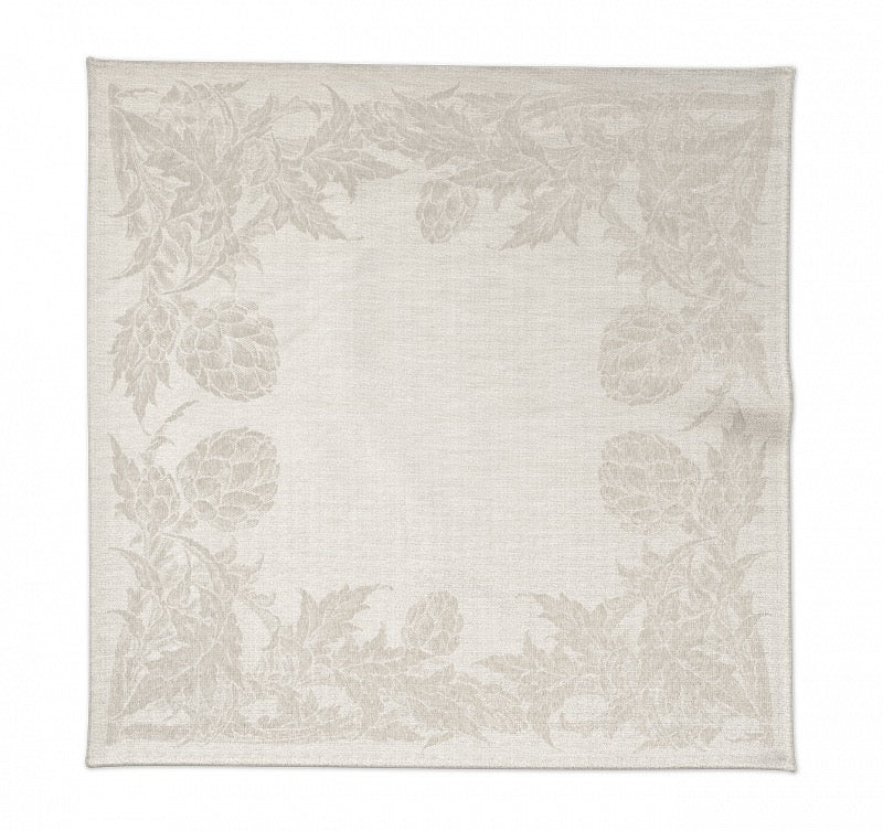Serviette Tosca aus 100 % Leinen in Sand mit mediterraner Jacquard-Bordüre und Artischockenmotiv.