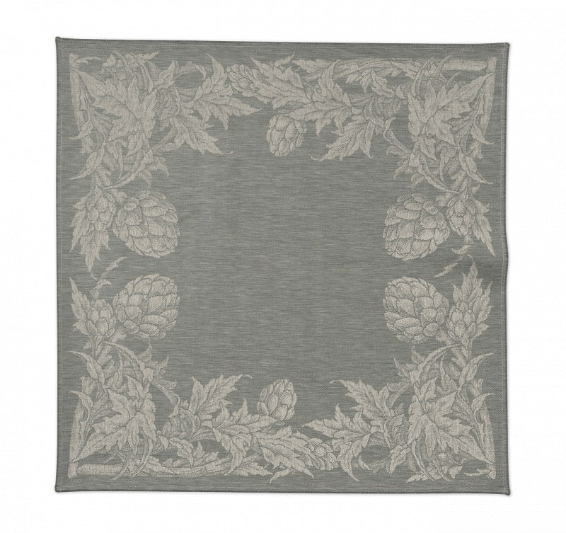 Serviette Tosca aus 100 % Leinen in Granitgrau mit mediterraner Jacquard-Bordüre und Artischockenmotiv.